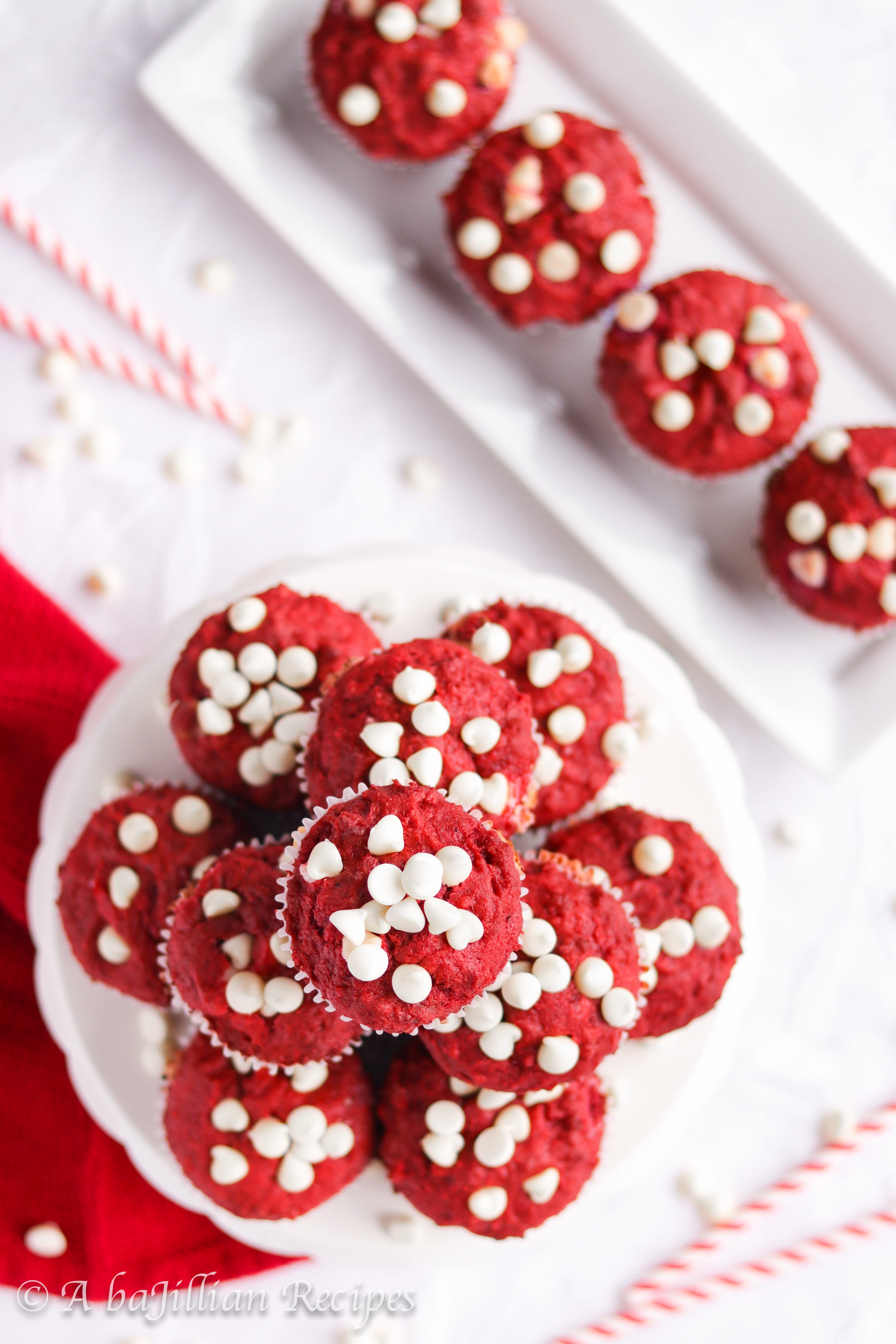 Moist and fluffy red velvet muffins loaded with white chocolate chips and filled with a sweetened cream cheese center!